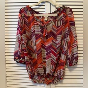 Banana Republic sheer graphic print blouse with tie neck. Size Medium